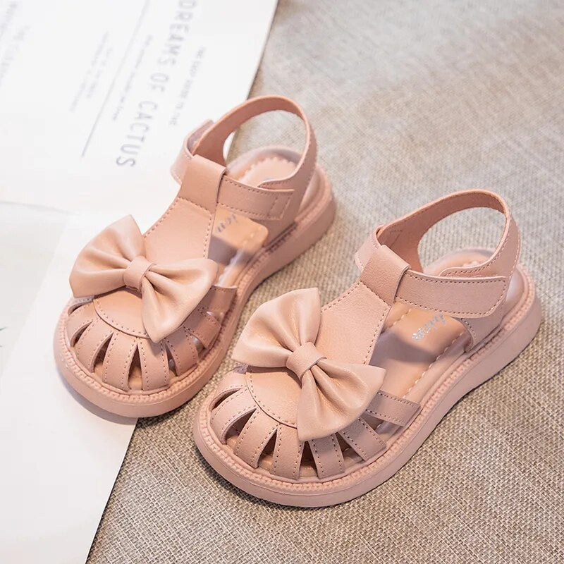 Sandalias de princesa con suela suave antideslizante y transpirable para niña, zapatos de playa antipatadas con punta hueca de Color sólido para niña